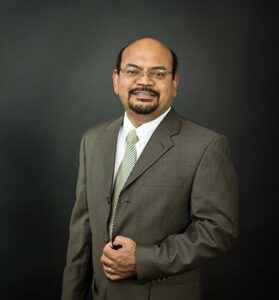 Dr. Varghese P. John