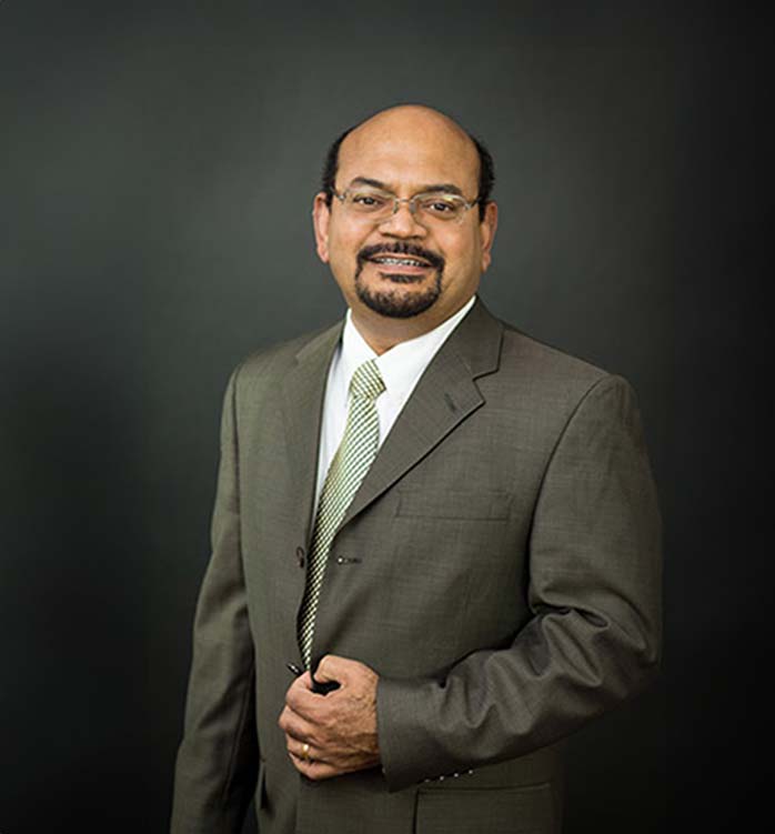 Dr. Varghese P. John