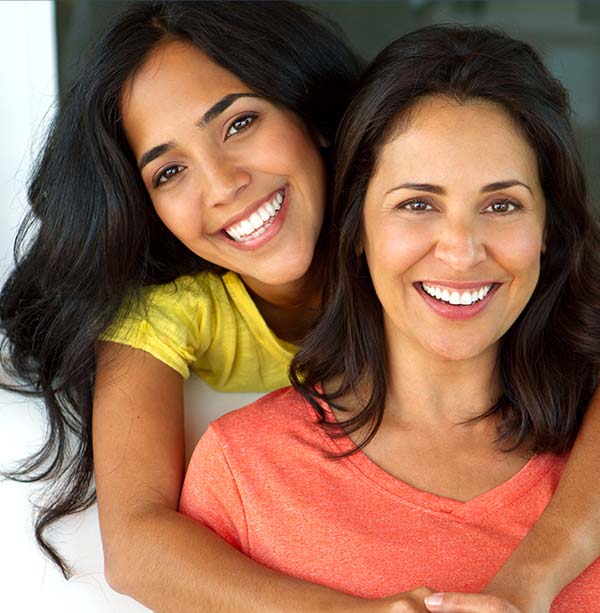 Mother and Daughter Smiling