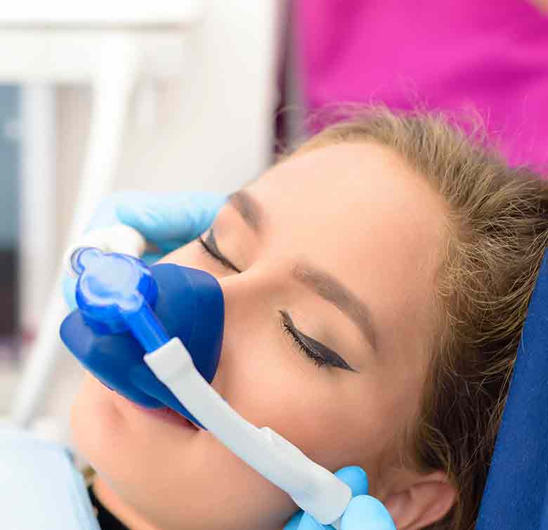 Woman-Getting-Laughing-Gas-Dentistry